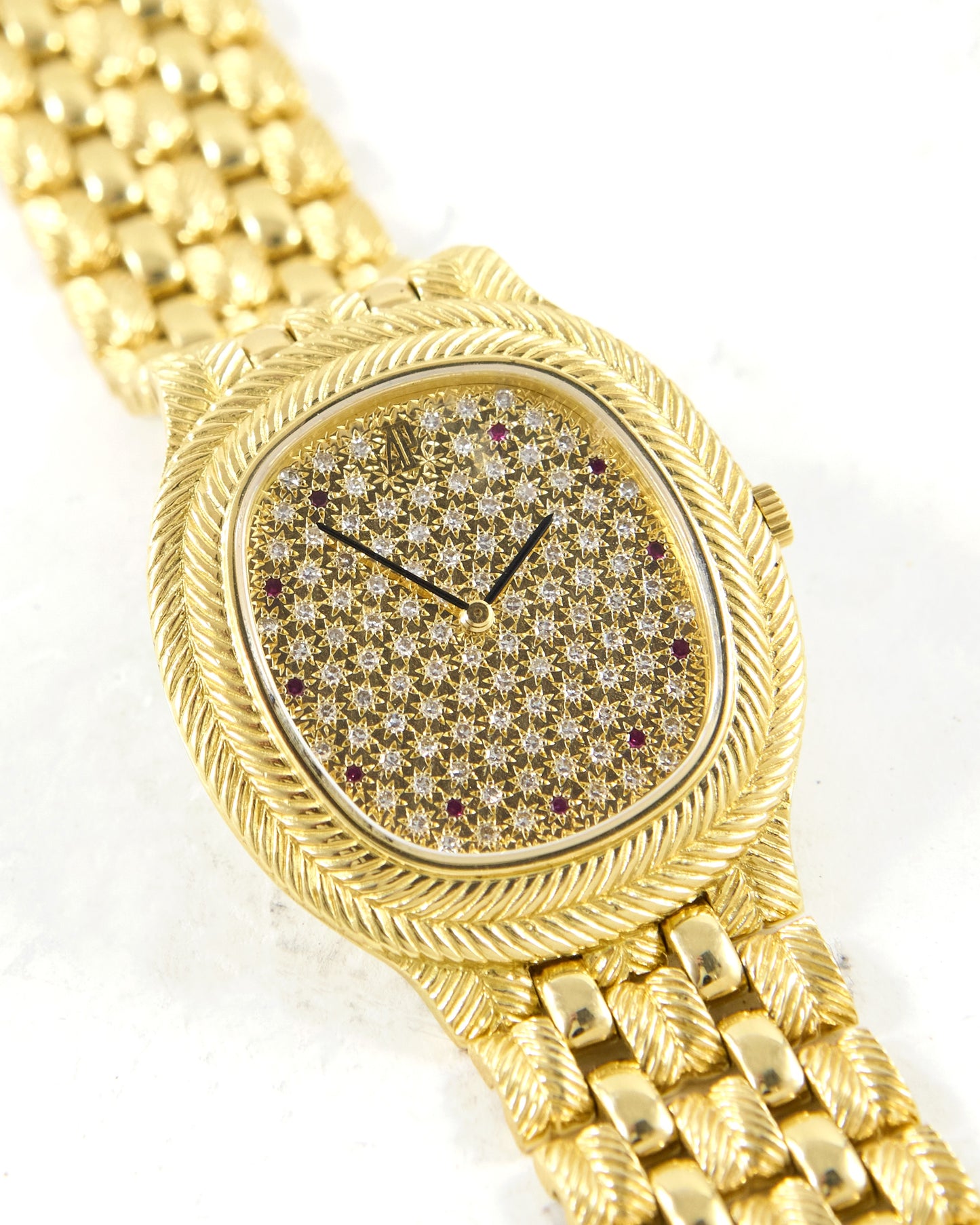Audemars Piguet Feather 56455BA Diamond Pave Dial with Rubies in Yellow Gold Case and Bracelet