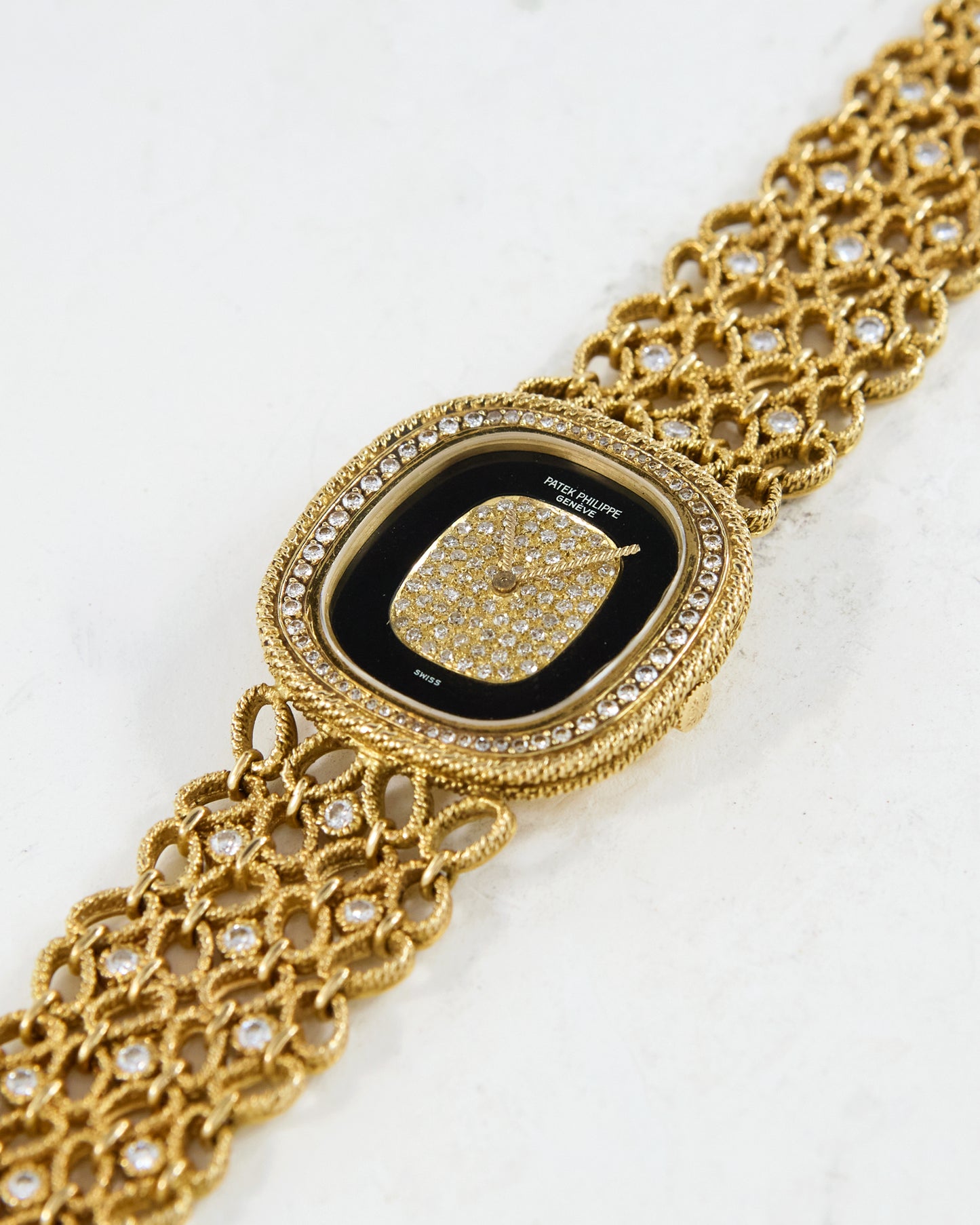 Patek Philippe Ellipse Onyx and Diamond Pave Dial on Gold Bracelet with Diamonds