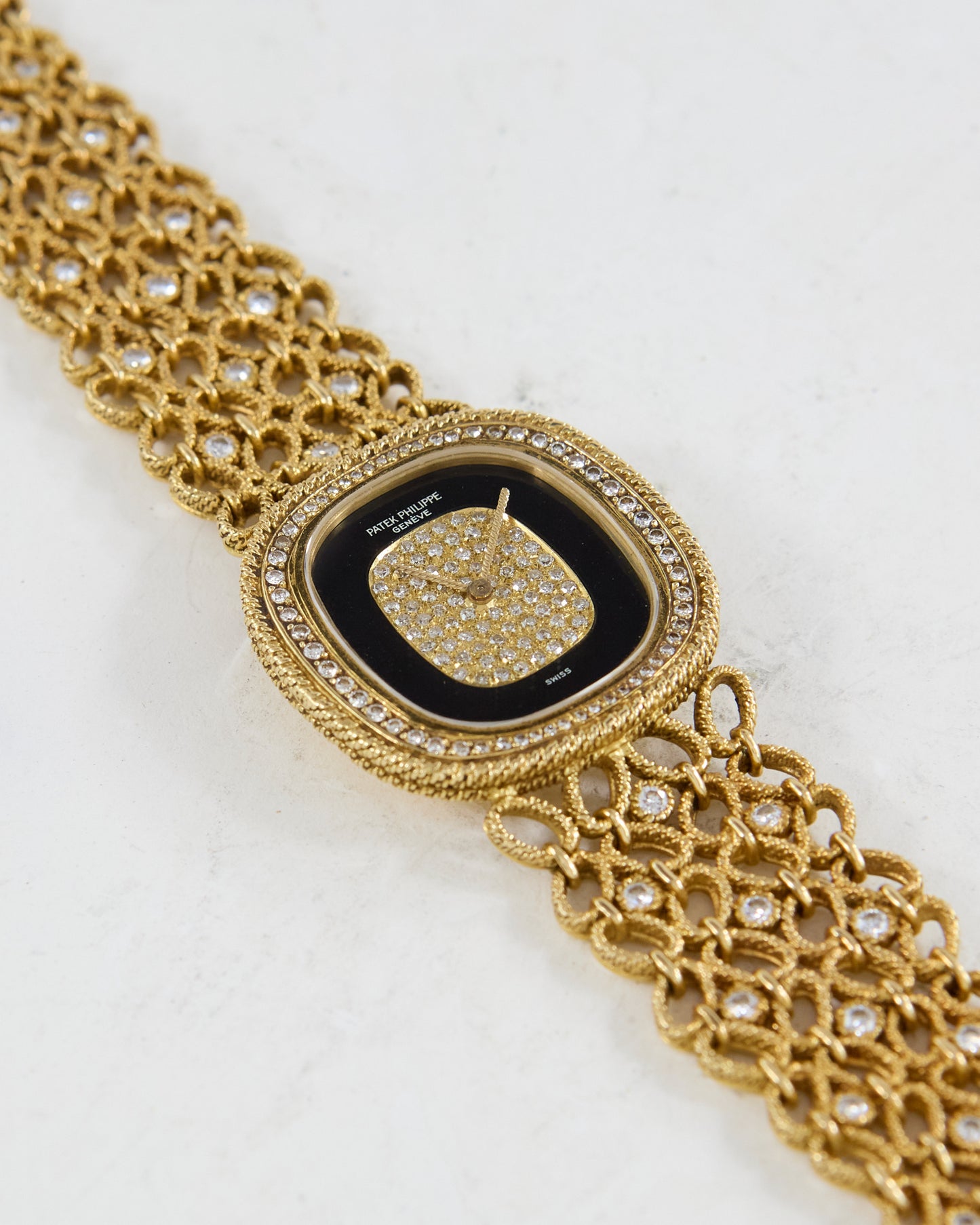 Patek Philippe Ellipse Onyx and Diamond Pave Dial on Gold Bracelet with Diamonds