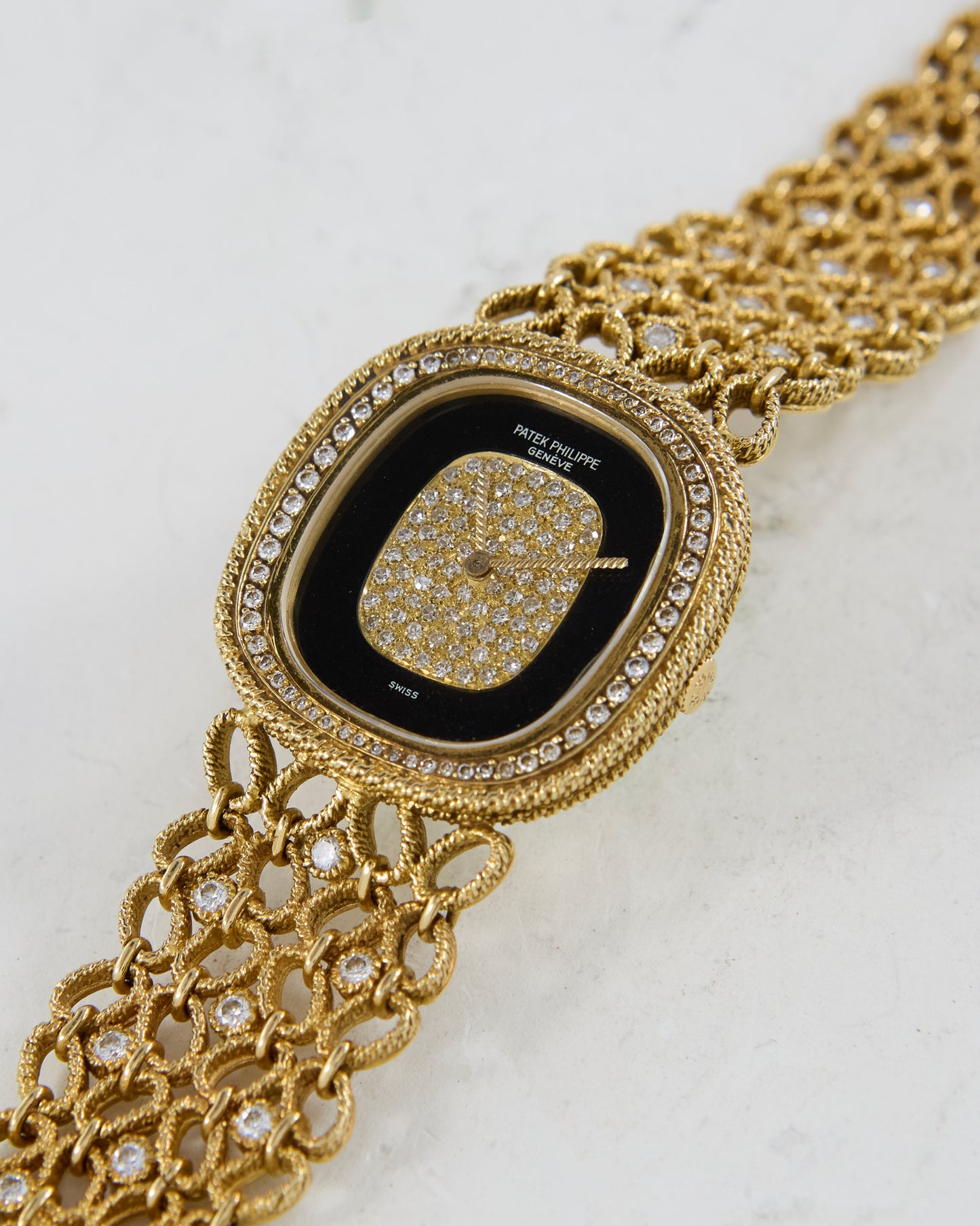 Patek Philippe Ellipse Onyx and Diamond Pave Dial on Gold Bracelet with Diamonds