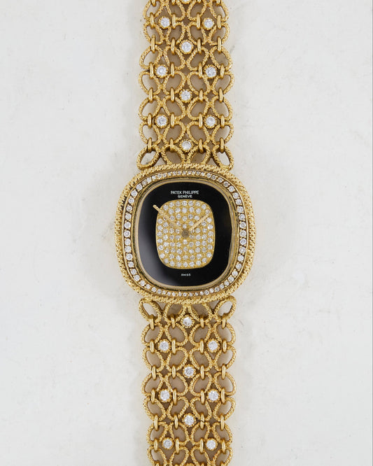 Patek Philippe Ellipse Onyx and Diamond Pave Dial on Gold Bracelet with Diamonds